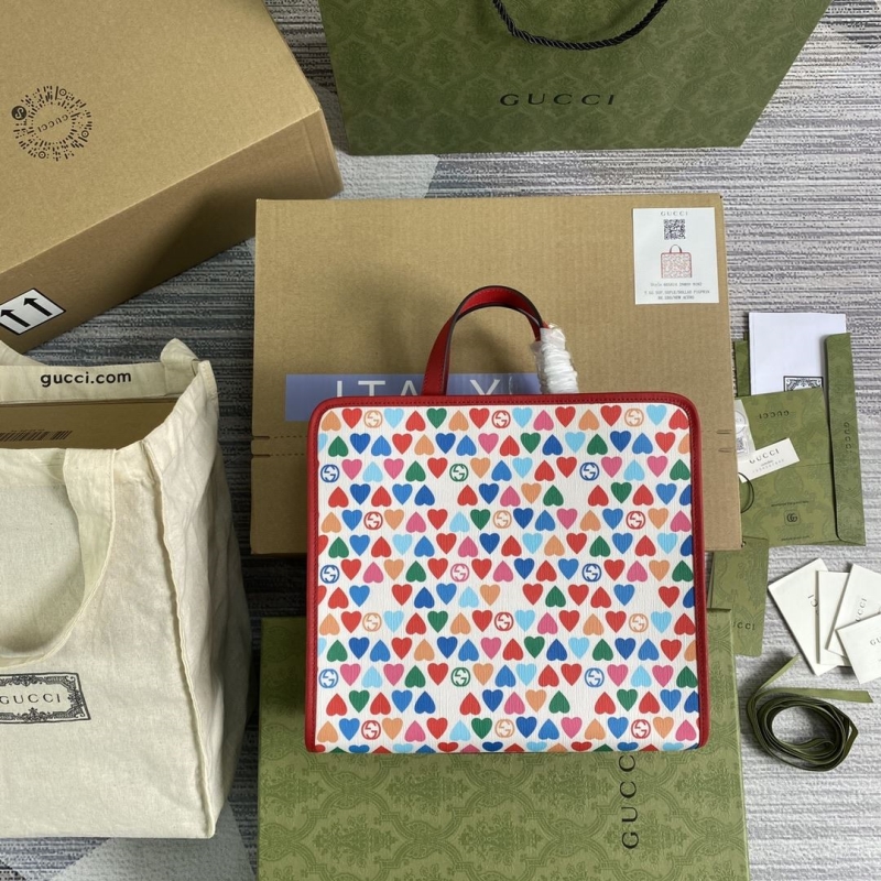 G*u*i shopping bags